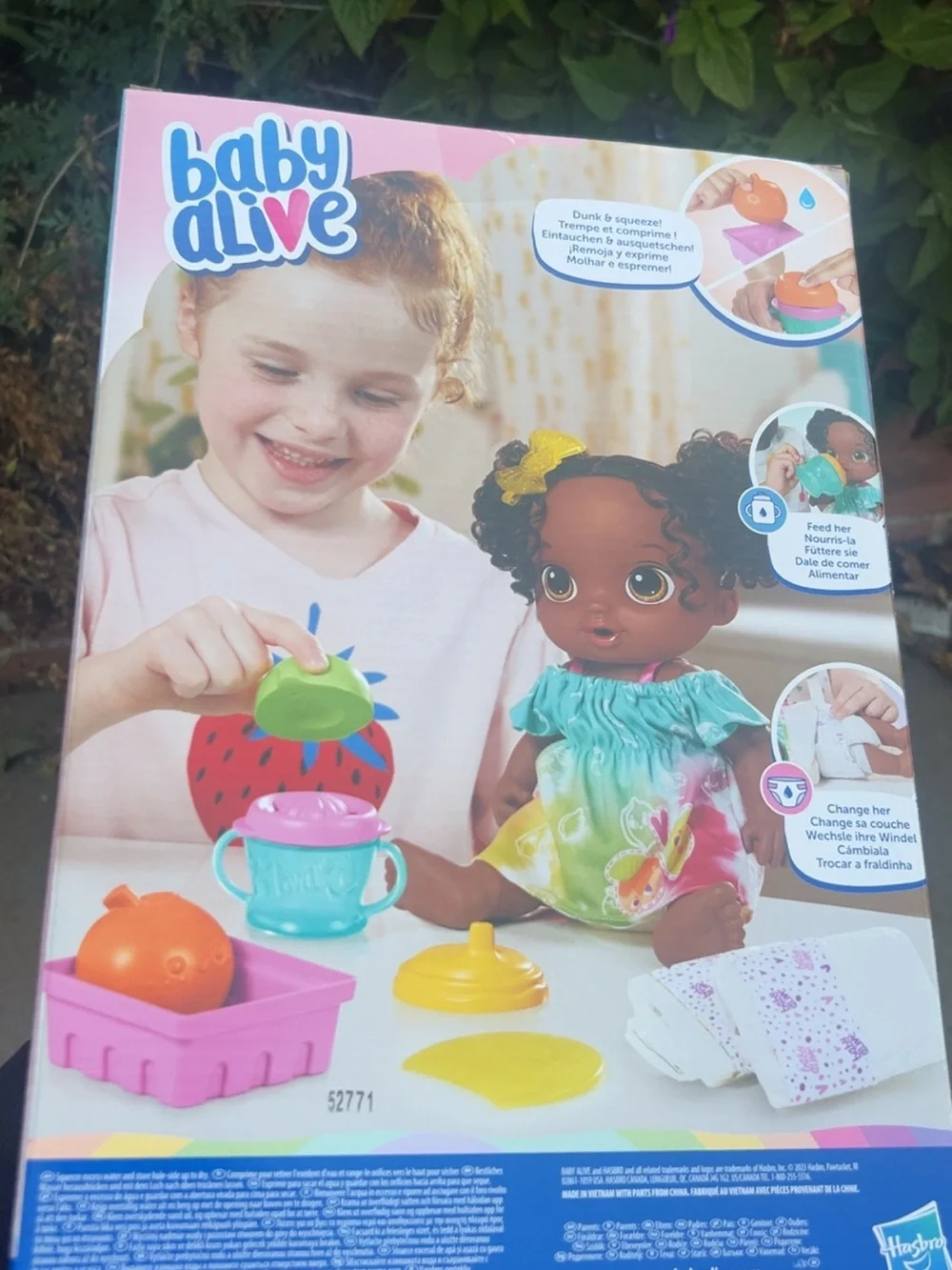 Hasbro Baby Alive Brown Doll in Green Fruit Dress with Pink Accessories